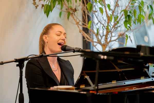 Adults learning piano in Boston