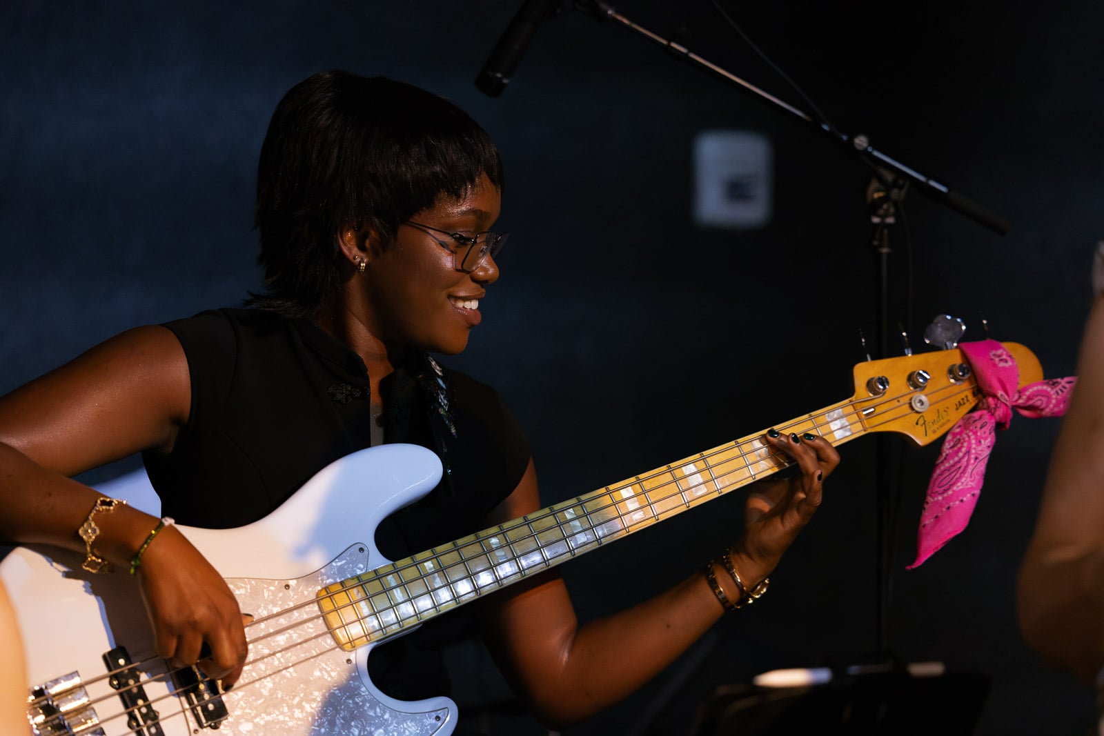 Adult bass student playing electric bass at Musicians Playground in Downtown Boston